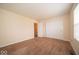 Comfortable bedroom with closet and carpet, providing functional and comfortable living space at 8410 Hague Rd # 5, Indianapolis, IN 46256