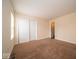 Bedroom with carpeted floor and closet, providing functional living space at 8410 Hague Rd # 5, Indianapolis, IN 46256