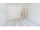 Bright bedroom featuring neutral walls and carpets and an open doorway to a bathroom at 864 Cowley Dr, Westfield, IN 46074