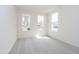 Bright bedroom with three large windows and neutral carpet, providing ample natural light and a cozy feel at 864 Cowley Dr, Westfield, IN 46074