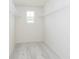 Spacious walk-in closet with white wire shelving and a window to let in natural light at 864 Cowley Dr, Westfield, IN 46074
