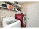 Bright laundry room equipped with a modern washer and dryer, offering convenience for household chores at 10973 Freeman Ct, Indianapolis, IN 46234