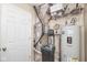 Well-maintained utility area featuring essential equipment, ensuring efficient home operations and maintenance at 10973 Freeman Ct, Indianapolis, IN 46234