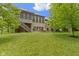 The backyard features an outdoor patio with a fire pit and comfortable seating at 11393 Muirfield Trce, Fishers, IN 46037