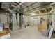 An unfinished basement featuring exposed ductwork and concrete flooring at 11393 Muirfield Trce, Fishers, IN 46037