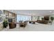 Finished basement offers ample space with a fireplace, pool table, TV, and natural light at 11393 Muirfield Trce, Fishers, IN 46037