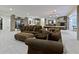 Finished basement featuring a kitchenette, a pool table, and a fireplace with stone surround at 11393 Muirfield Trce, Fishers, IN 46037