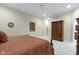 Inviting bedroom with a wooden bed, wardrobe, and tasteful decor, creating a warm atmosphere at 11393 Muirfield Trce, Fishers, IN 46037