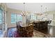 Open layout kitchen and dining area with modern lighting and ample space at 11393 Muirfield Trce, Fishers, IN 46037