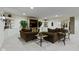 Living room featuring neutral walls, carpet, entertainment center and built-in shelving at 11393 Muirfield Trce, Fishers, IN 46037