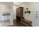 Inviting mud room with custom storage solutions and convenient bench seating at 11393 Muirfield Trce, Fishers, IN 46037
