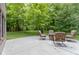 A patio with comfortable seating and a fire pit offers an inviting outdoor gathering spot at 11393 Muirfield Trce, Fishers, IN 46037