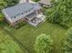 Aerial view of the backyard, highlighting the spacious deck and lawn at 11409 Haverstick Rd, Carmel, IN 46033