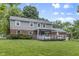 Two-story home with a spacious backyard and inviting deck at 11409 Haverstick Rd, Carmel, IN 46033