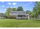 Two-story home with a spacious backyard and an inviting deck at 11409 Haverstick Rd, Carmel, IN 46033