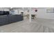 Basement with a sitting area, desk, dining table, and neutral carpeting at 11409 Haverstick Rd, Carmel, IN 46033