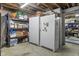 Basement with storage shelves and freezers at 11409 Haverstick Rd, Carmel, IN 46033