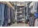 Organized walk-in closet with shelves, hanging rods, and ample storage space at 11409 Haverstick Rd, Carmel, IN 46033