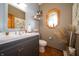 Charming bathroom with a vanity, mirror, decorative window and stylish decor at 1145 Forest Commons Dr, Avon, IN 46123