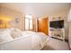 Cozy bedroom with a neutral color palette, plush bedding, and a quaint window seat at 1145 Forest Commons Dr, Avon, IN 46123