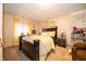 Basement bedroom with a queen size bed, side tables and vintage decorations at 1145 Forest Commons Dr, Avon, IN 46123