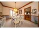 Formal dining room with a stylish table, elegant chairs, and decorative lighting, ideal for entertaining at 1145 Forest Commons Dr, Avon, IN 46123