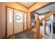 Spacious foyer with a tiled floor, staircase, and natural light streaming in from the front door at 1145 Forest Commons Dr, Avon, IN 46123