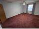Expansive bedroom is bright with natural light and neutral carpet at 1201 Briarwood Dr, Brownsburg, IN 46112