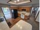Well-lit kitchen featuring oak cabinets, modern white appliances, and black refrigerator at 1201 Briarwood Dr, Brownsburg, IN 46112