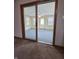 Bright sunroom with sliding glass doors leading to the exterior at 1201 Briarwood Dr, Brownsburg, IN 46112