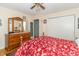Bright bedroom with wood furnishings and an inviting bed at 12014 Briar Way Center Dr, Indianapolis, IN 46126