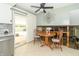 Bright kitchen featuring sleek appliances, tiled backsplash, and access to a backyard pool at 12014 Briar Way Center Dr, Indianapolis, IN 46126
