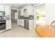 Updated kitchen features stainless appliances and view to the backyard at 12014 Briar Way Center Dr, Indianapolis, IN 46126