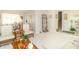 Bright, open living room with neutral carpet and traditional furniture flows easily into adjacent spaces at 12014 Briar Way Center Dr, Indianapolis, IN 46126