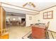 Open living room featuring a seamless blend of office space and Gathering area with neutral tones at 12014 Briar Way Center Dr, Indianapolis, IN 46126