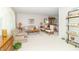 Spacious living room featuring neutral walls, plush carpet, and traditional furniture creates a warm, inviting atmosphere at 12014 Briar Way Center Dr, Indianapolis, IN 46126