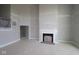 Unfinished living room showcasing a fireplace, neutral paint, and an open-concept design at 12338 French Cattle Way, Noblesville, IN 46060