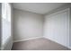 Bedroom features neutral carpet, fresh paint, double closet and bright window at 12382 Cool Winds Way, Fishers, IN 46037