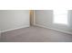 Bright bedroom with neutral carpet, fresh paint, and plenty of natural light at 12382 Cool Winds Way, Fishers, IN 46037