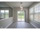 Bright dining room showcasing backyard view with a sliding glass door at 12382 Cool Winds Way, Fishers, IN 46037
