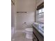 Bathroom featuring toilet, shower, dark wood vanity and granite countertop at 13429 Boxelder Ct, Carmel, IN 46074
