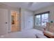 Bedroom featuring a chair and ottoman by the window at 13429 Boxelder Ct, Carmel, IN 46074