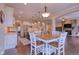 Gourmet kitchen with a center island and view to a lovely breakfast area and hearth room at 13429 Boxelder Ct, Carmel, IN 46074