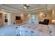 Spacious main bedroom with neutral carpet, large windows and en-suite bathroom access at 13429 Boxelder Ct, Carmel, IN 46074