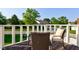 Outdoor balcony features comfortable seating and a view of the surrounding neighborhood at 1510 Dominion Dr, Zionsville, IN 46077