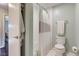 Bathroom featuring a toilet, a white tile shower/tub combo and a white shower curtain at 1510 Dominion Dr, Zionsville, IN 46077