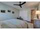 Comfortable bedroom featuring a ceiling fan, neutral paint, a stylish area rug, and a closet at 1510 Dominion Dr, Zionsville, IN 46077