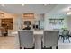 Open-concept kitchen with island, stainless steel appliances, and adjacent dining area at 1510 Dominion Dr, Zionsville, IN 46077
