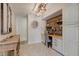Charming office nook features a wooden accent wall, built-in desk, and lots of storage at 1510 Dominion Dr, Zionsville, IN 46077