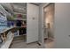 View of the walk-in pantry and half bath, allowing for lots of storage in the home at 1510 Dominion Dr, Zionsville, IN 46077